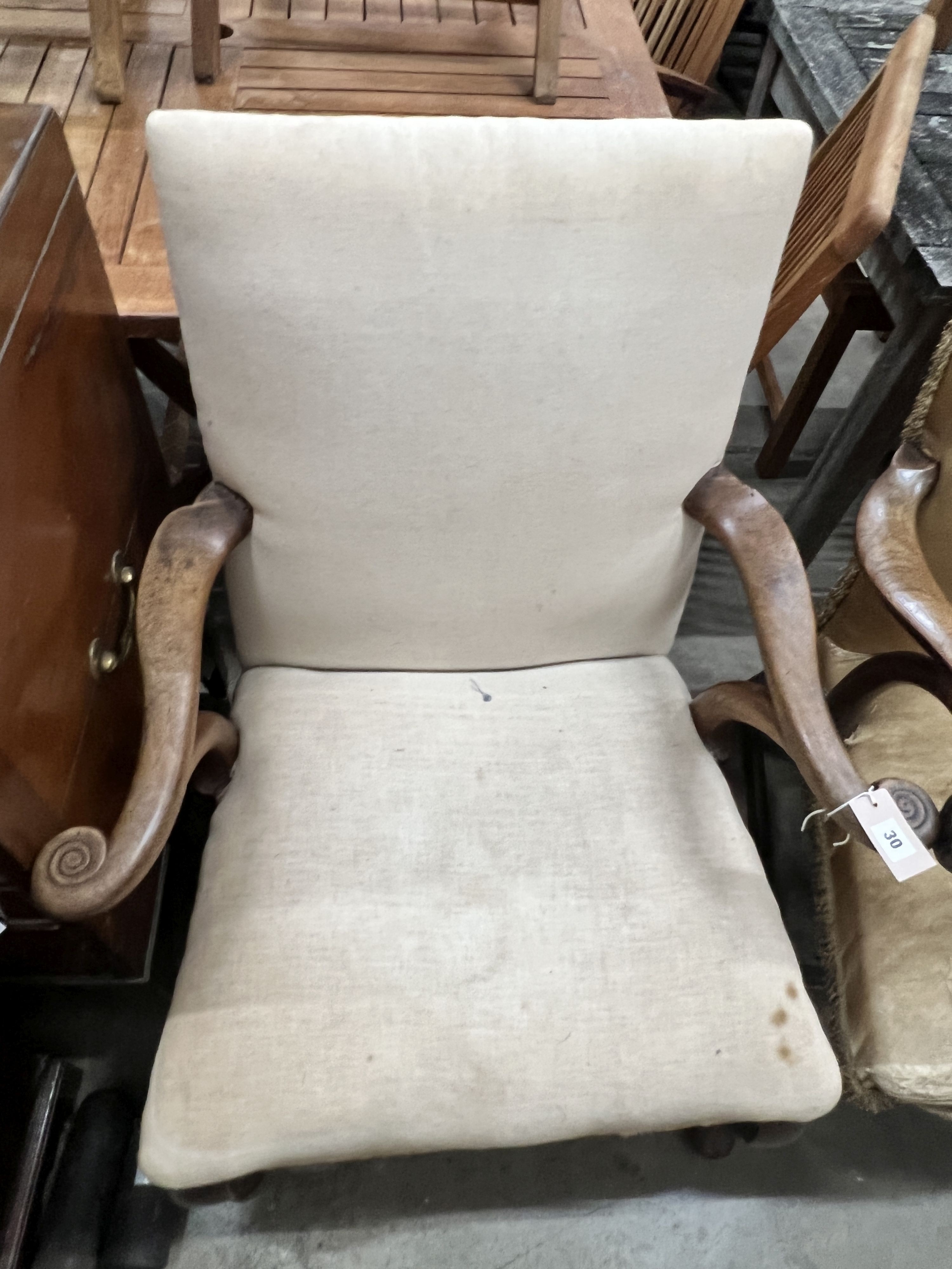 A Georgian mahogany scroll arm elbow chair on cabriole legs and pad feet, width 72cm, depth 60cm, height 98cm